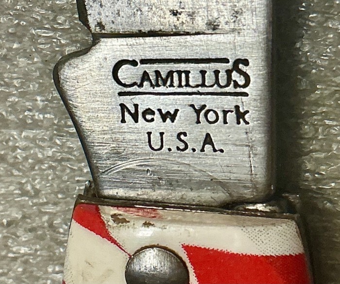 The Main Blade Front Tang Stamp.<br />CAMILLUS SB100F-"Ol' Glory" Series<br />Pocket Knife #54.