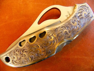 Engraved stainless knife.jpg