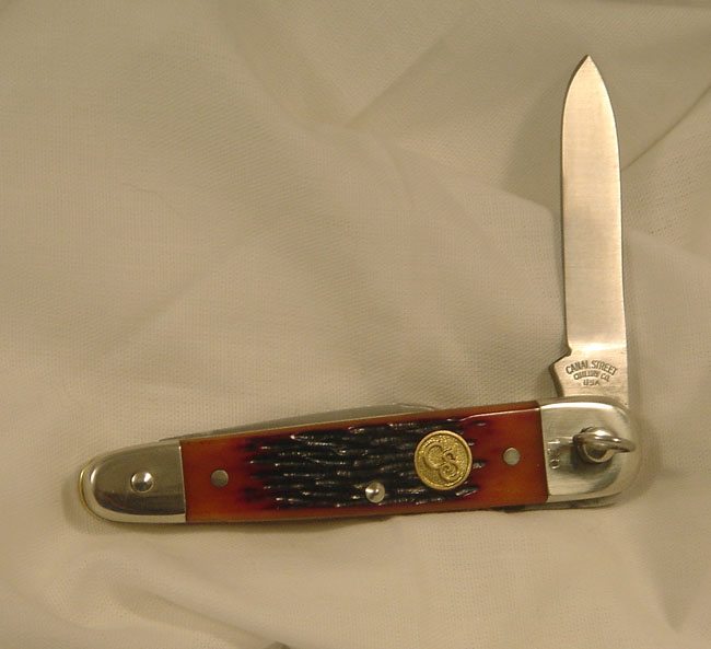 Canal Street sleeveboard ring opener.jpg