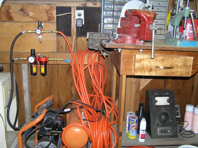 150 psi compressor. 1 line has an oiler for pneumatic tools and the other is a dry air line for blowing stuff out of knives and the turbo-carver