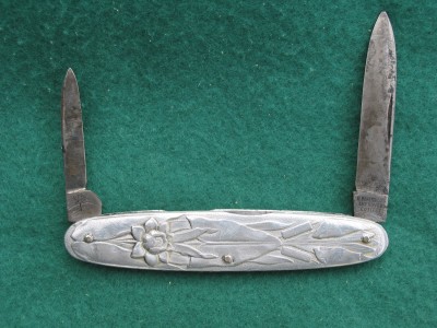 H. Boker &amp; Co's Improved Cutlery with brushed aluminum handles.